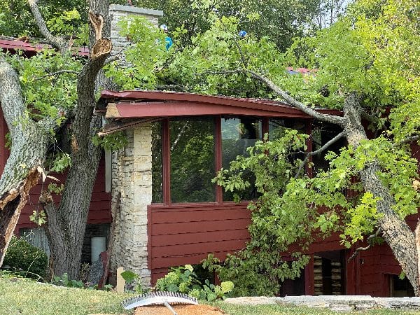 Emergency Tree Services for storm damage clean-up after a tree falls onto a home in Waukesha.